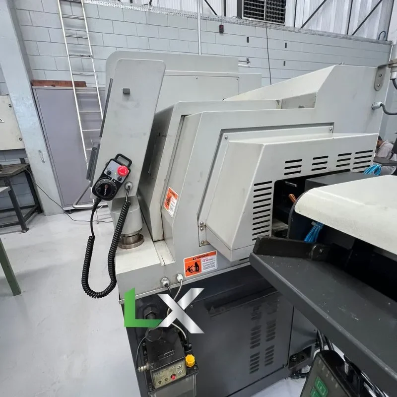 TORNO CABEÇOTE MOVEL CNC HANWHA XD20M - 2013 - COM ALIMENTADOR DE BARRAS (1)