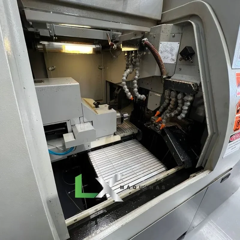 TORNO CABEÇOTE MOVEL CNC HANWHA XD20M - 2013 - COM ALIMENTADOR DE BARRAS (2)