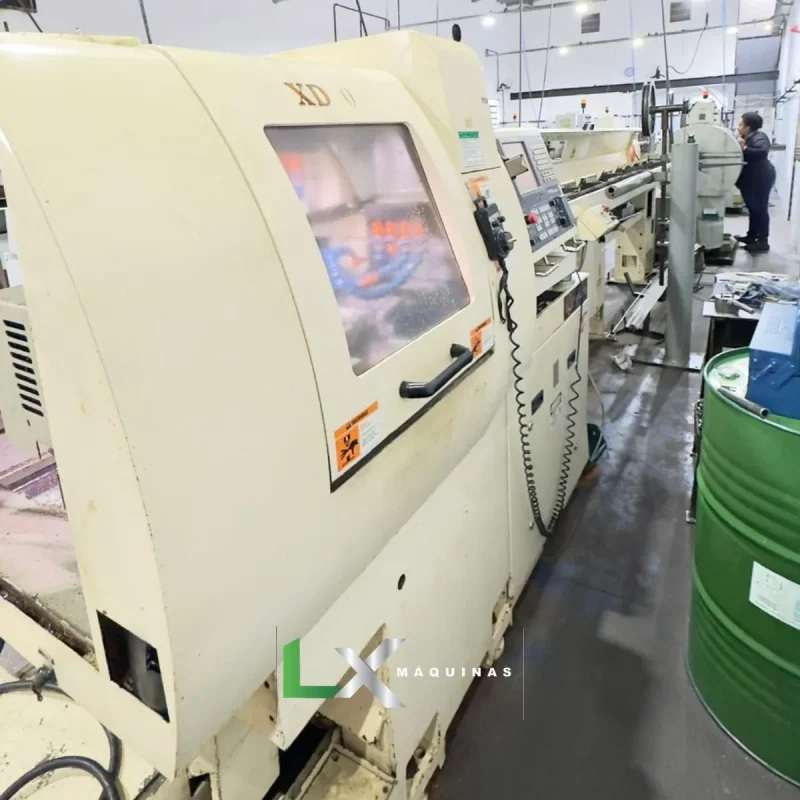 TORNO CNC CABEÇOTE MÓVELX HANWHA XD20H- COM ALIMENTADOR DE BARRAS - ANO 2007 (6)